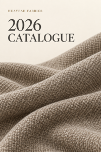 Huayeah Fabrics 2026 catalogue cover with textured upholstery fabric